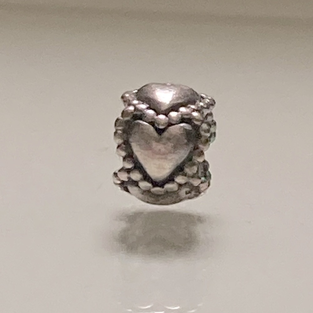 Pandora circular hearts charm